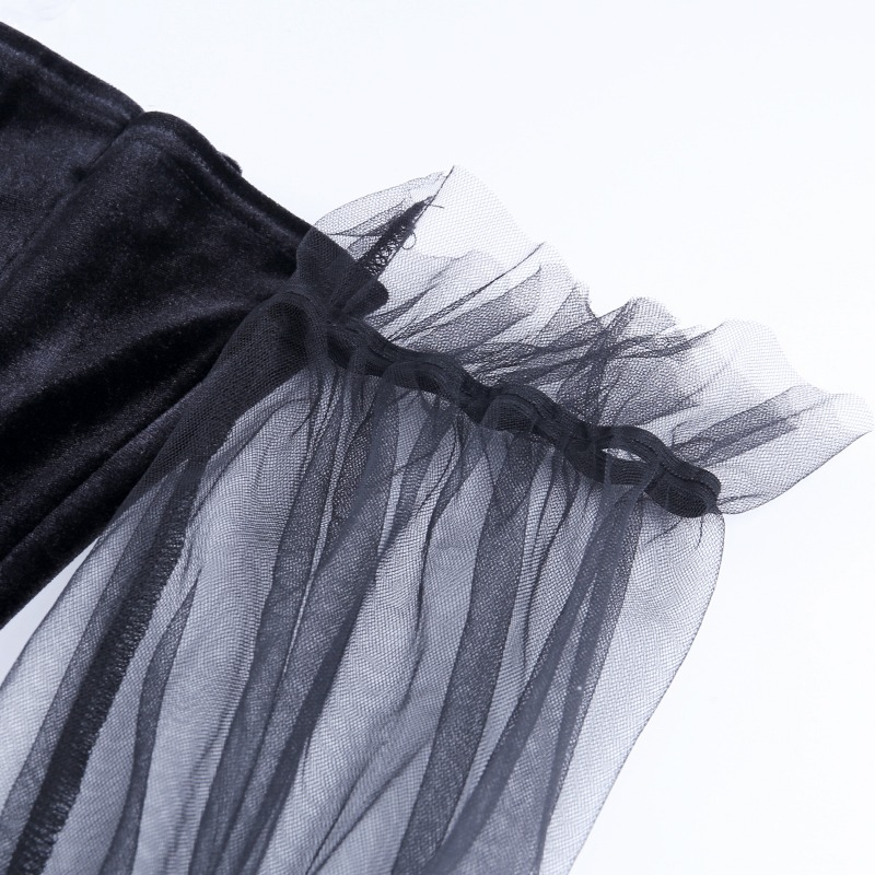Close-up of black gothic mini dress puff sleeves detail, showcasing sheer mesh for a punk rock aesthetic.
