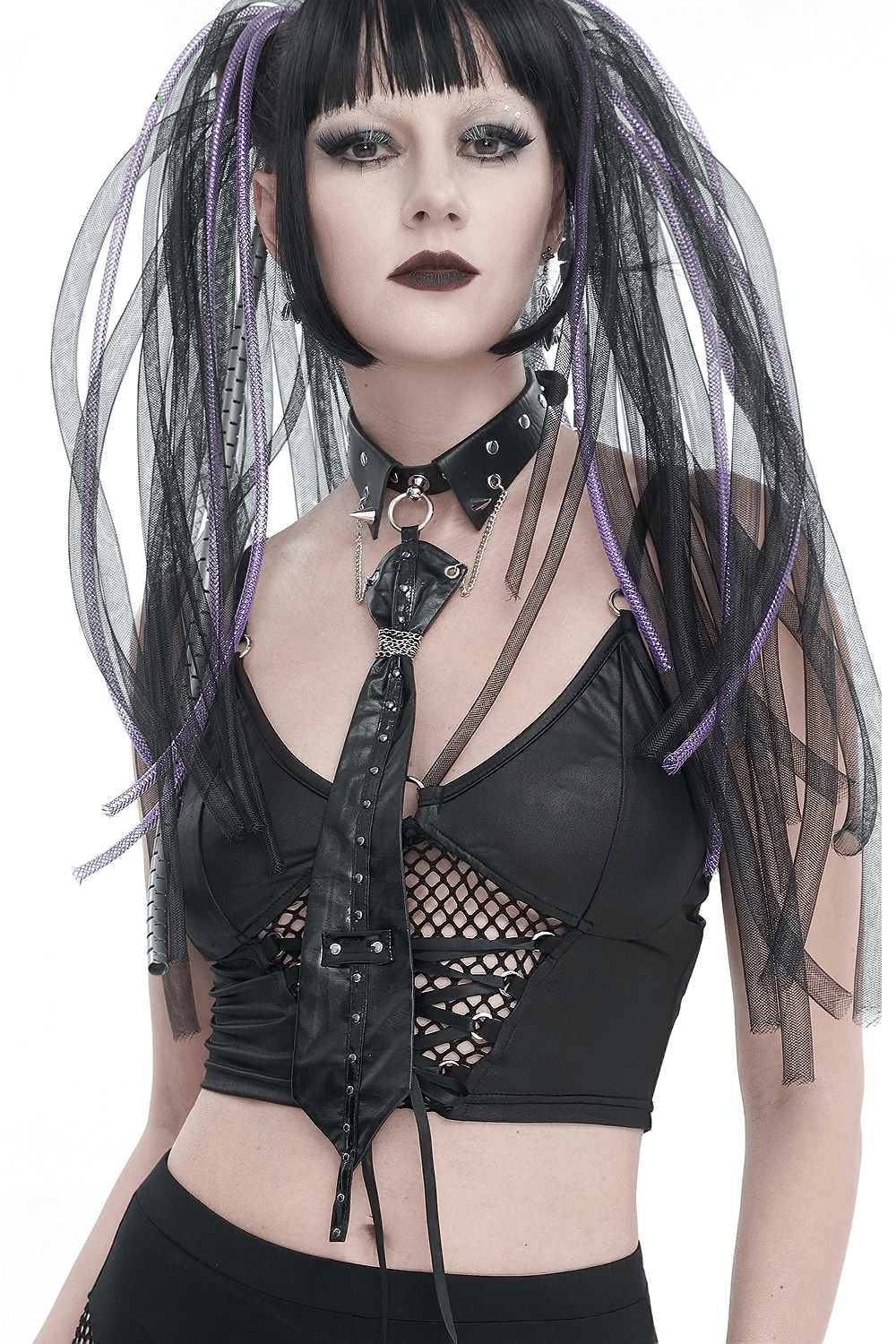 Woman in goth-style outfit wearing a black O-ring studs buckle tie and edgy accessories.