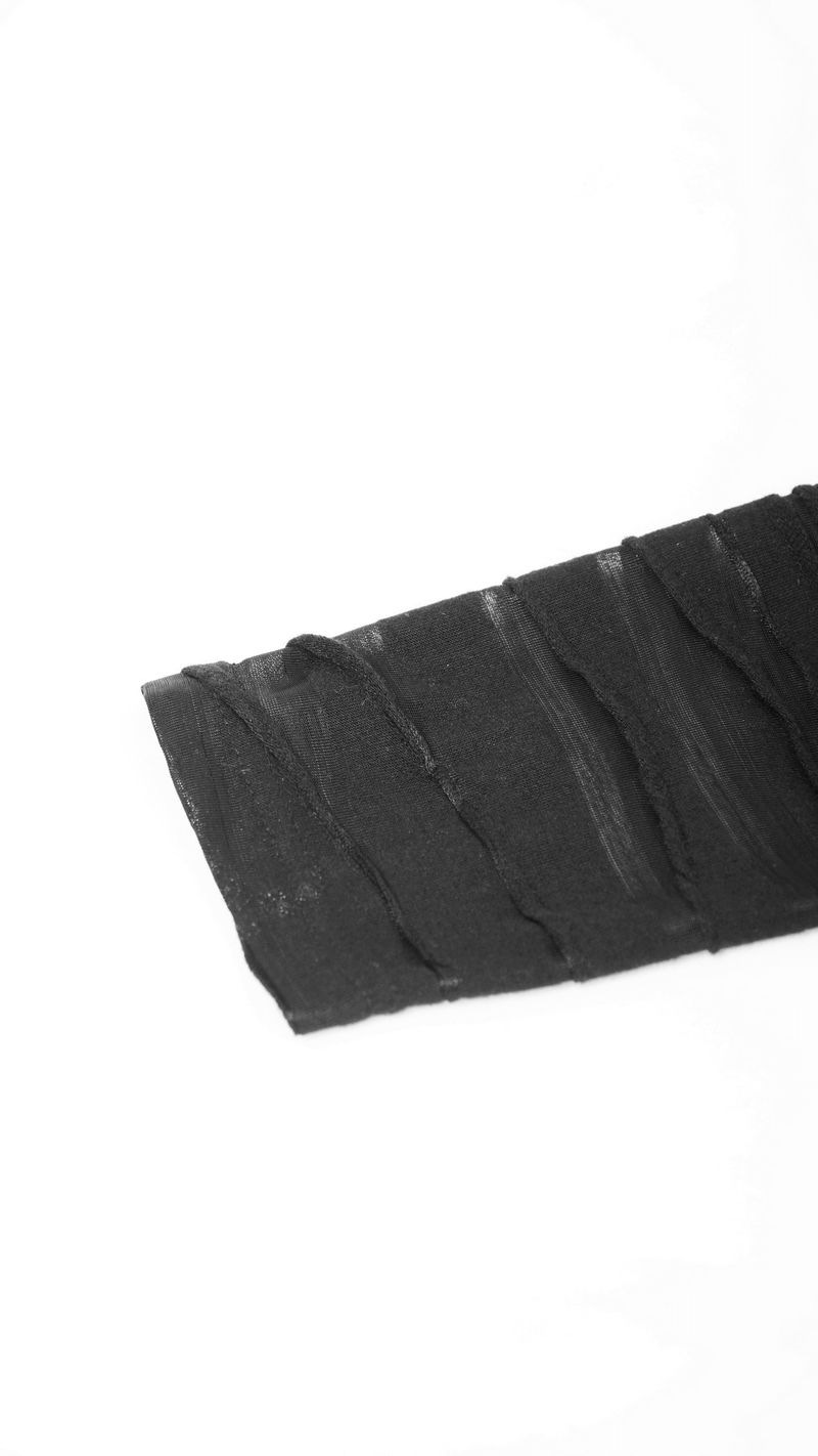 Close-up of a black long sleeve fabric with stylish transparent layers and unique texture for a punk aesthetic.