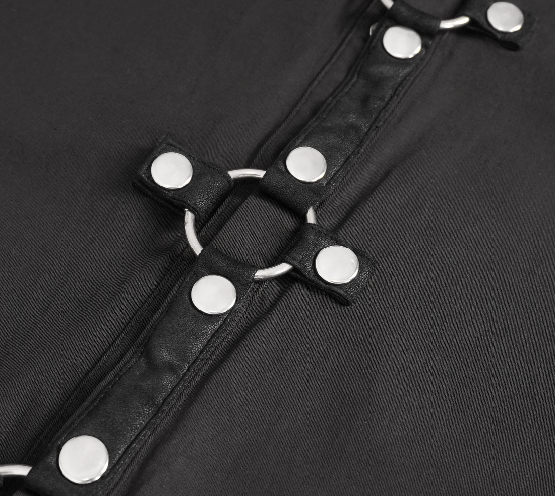 Close-up of black fabric with metallic snaps and imitation leather detailing for a gothic punk shirt.