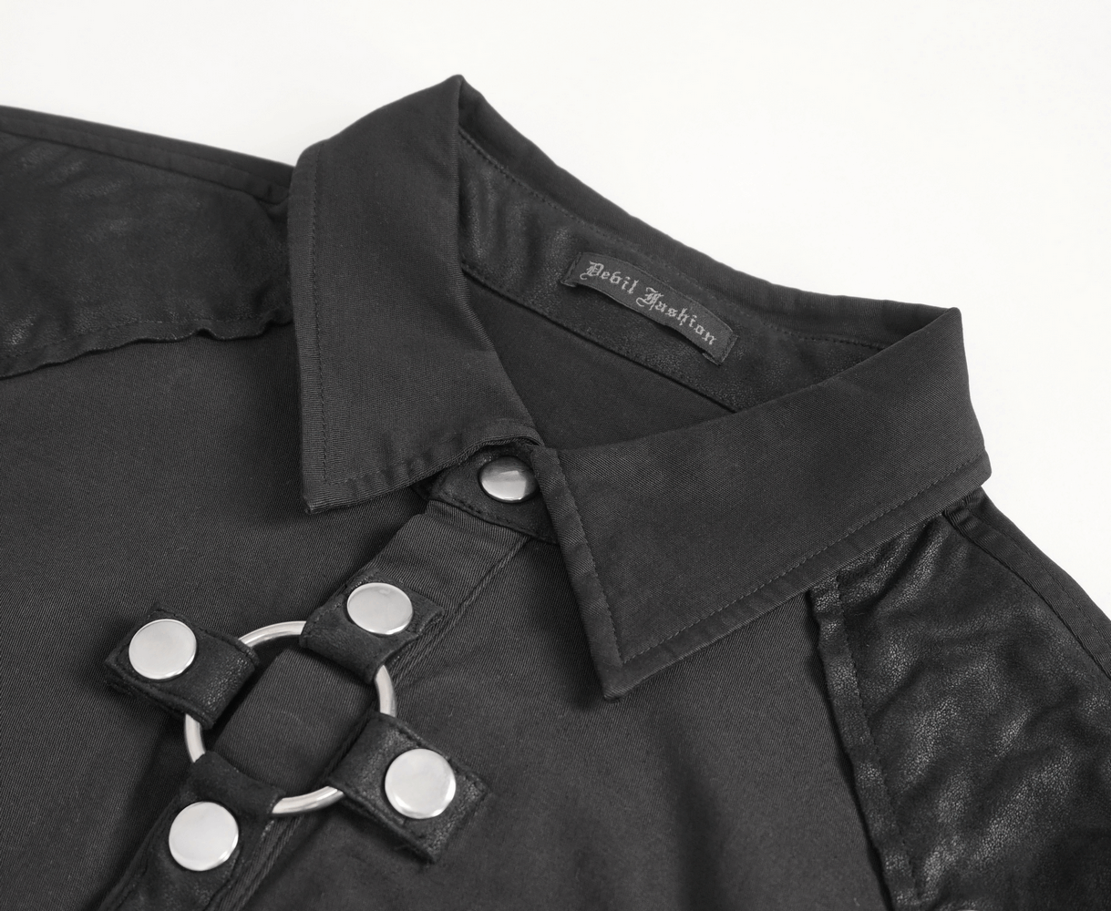 Close-up of black gothic punk short-sleeve shirt collar with metallic button detail.