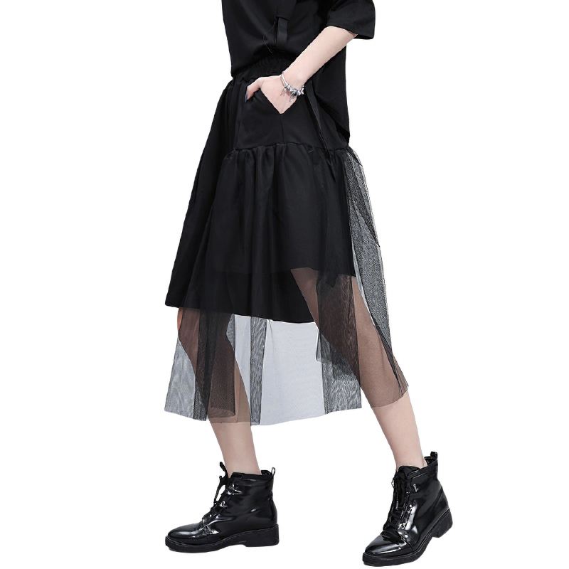 Black mesh layered skirt for alternative fashion, perfect for a gothic or rockstar outfit.