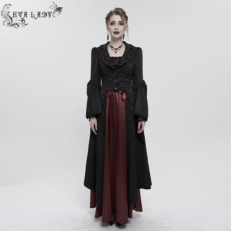 Elegant gothic long black coat with flared sleeves and beaded detailing on model.