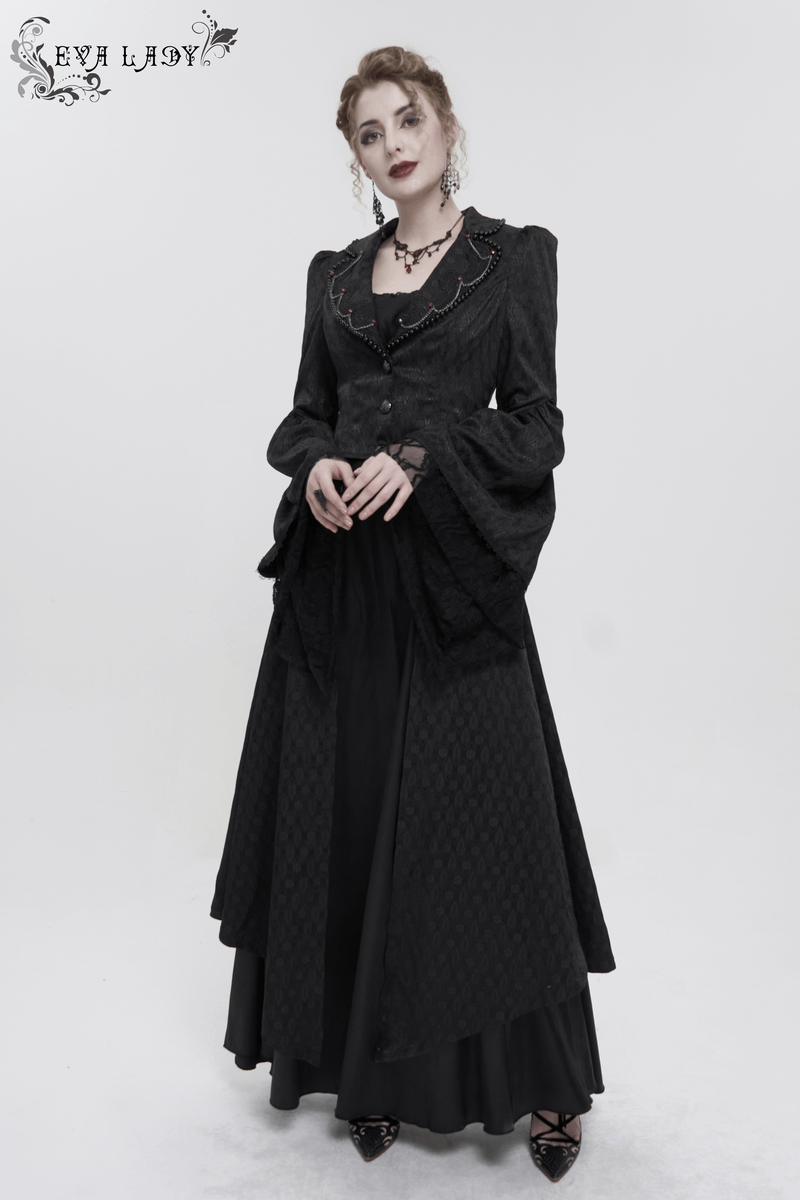 Elegant model wearing a black gothic long coat with flared sleeves and beaded details, perfect for retro fashion lovers.
