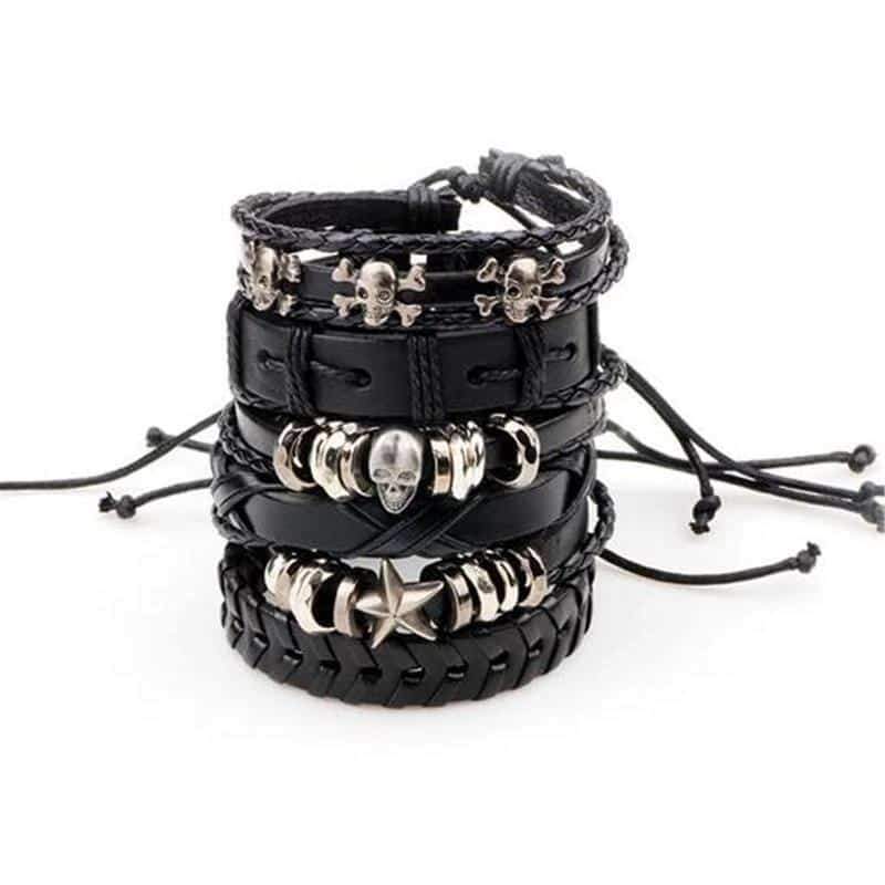 Set of 6 black leather bracelets featuring skull and star designs, perfect for unisex rock style fashion.