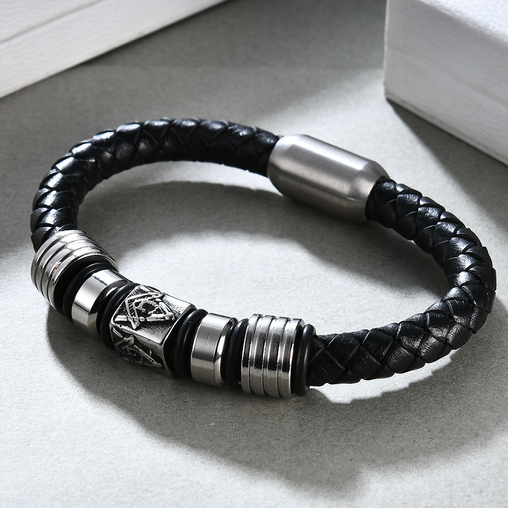 Stylish black leather Masonic bracelet with stainless steel magnet, perfect for men and women. Trendy jewelry for any outfit.