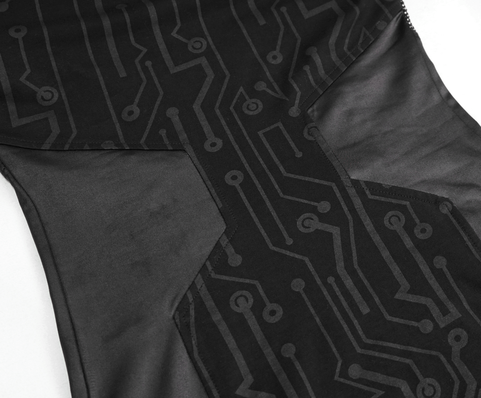 Close-up of black fabric featuring a sleek circuit board design, ideal for futuristic fashion designs.
