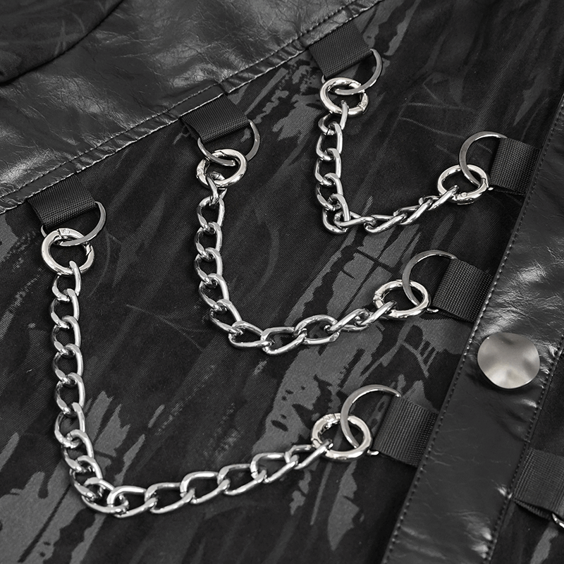 Close-up of detachable chains on a black gothic shirt, highlighting stylish PU leather inserts and edgy accessories.