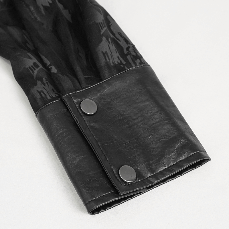 Close-up of black long sleeve shirt cuff with PU leather insert and button detail for a gothic style look.