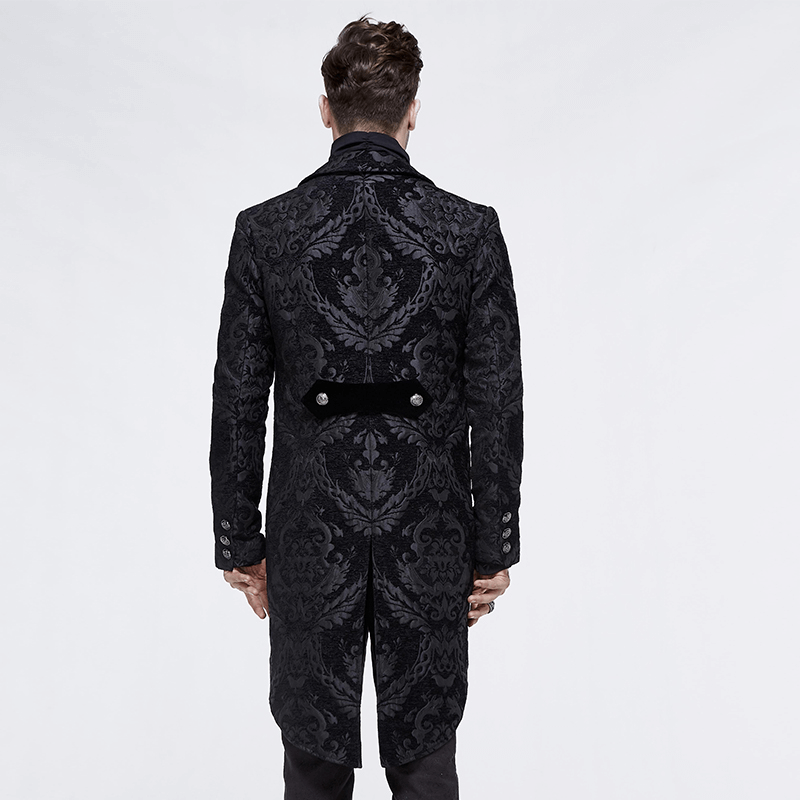 Back view of a men's black vintage long trench coat in gothic style, featuring ornate patterns and silver buttons.