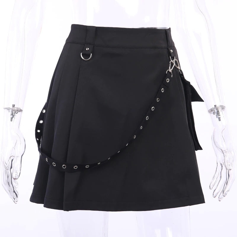 Stylish black mini skirt with metallic strap and pocket, perfect for edgy summer streetwear.