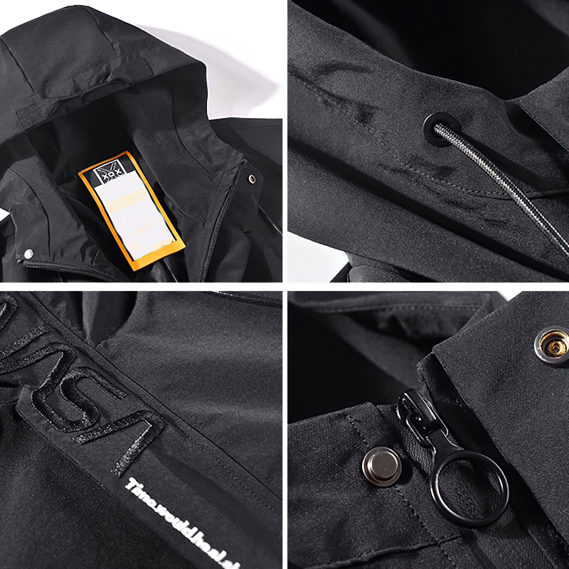 Close-up of a black multi-pocket cargo jacket featuring a hood, zippers, and stylish details for men's casual wear.