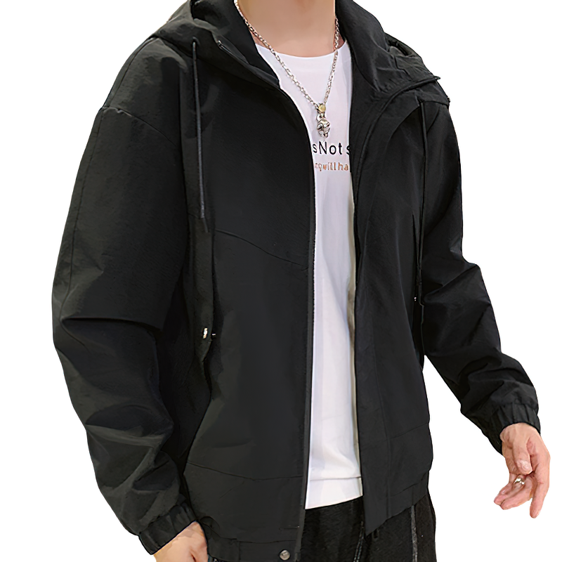 Black multi-pocket cargo jacket with hood, perfect casual outerwear for men, styled with jeans.
