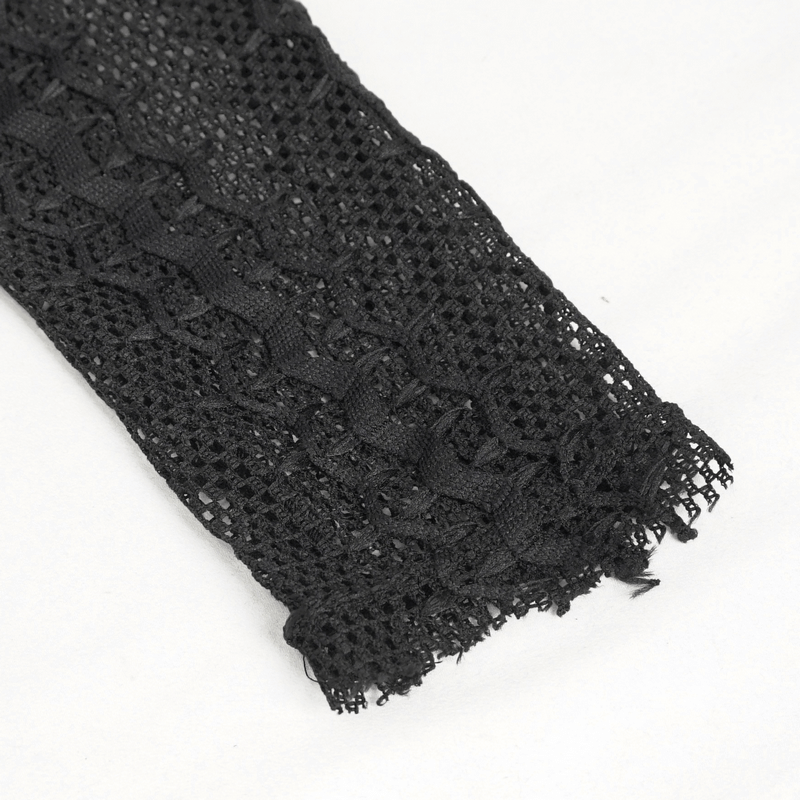 Close-up of black net splicing fabric, showcasing the intricate texture perfect for gothic-style dresses.