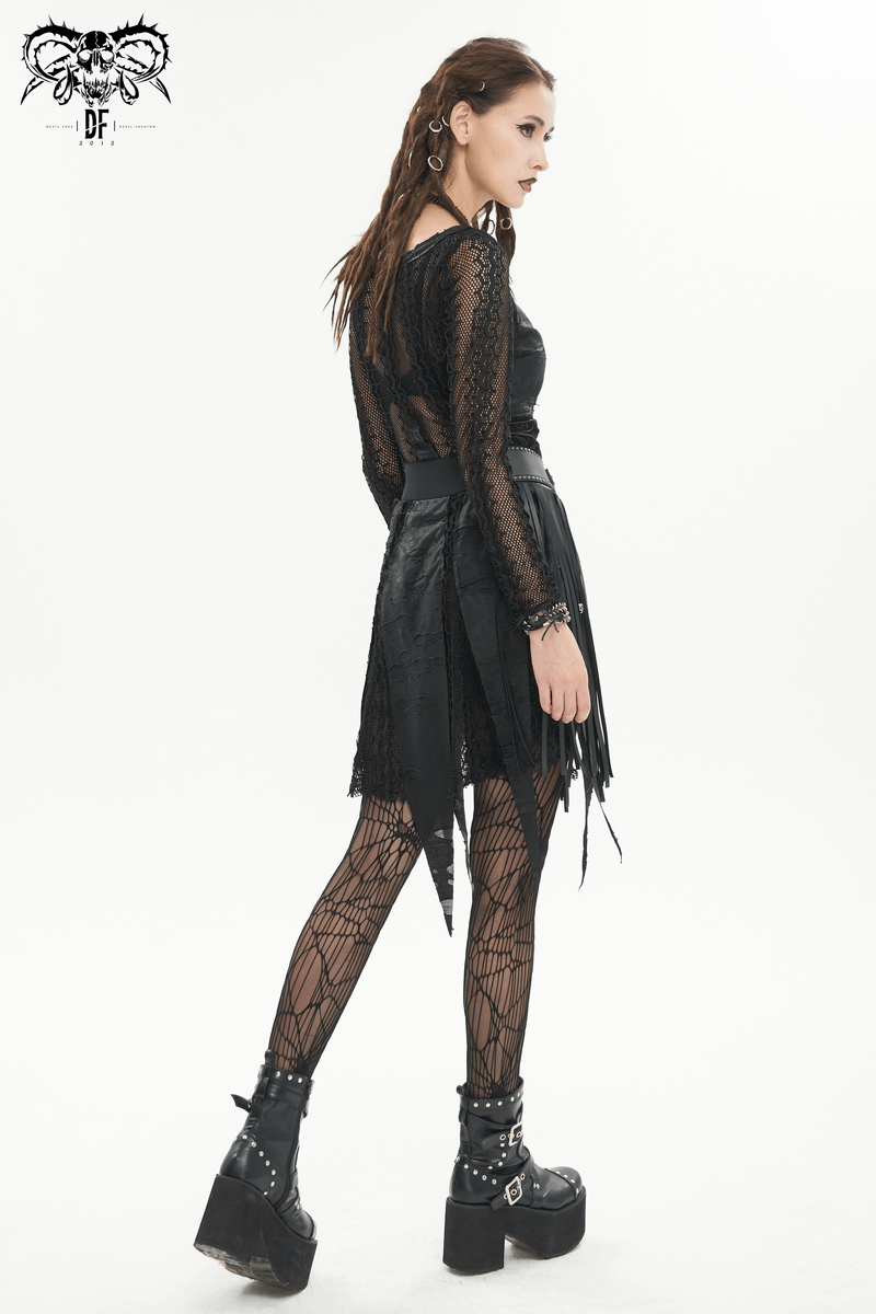 Gothic-inspired black net splicing short dress with irregular hem, styled with fishnet tights and platform boots.