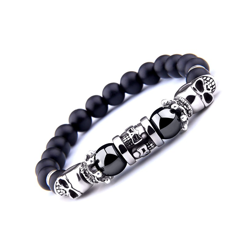 Black onyx stone antique skull head bracelet featuring silver skull beads, perfect punk jewelry for men and women.