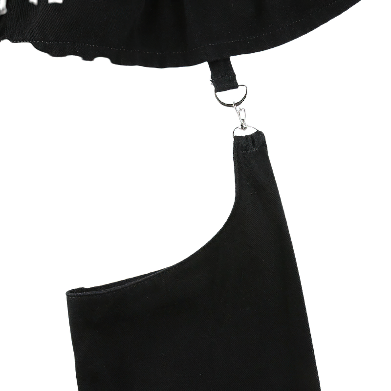 Close-up of black skirt pants with unique hook and pocket design, perfect for gothic streetwear style.