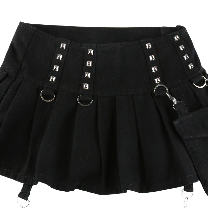 Black patchwork pants skirt for women with silver rivets and pockets, perfect for gothic streetwear style.