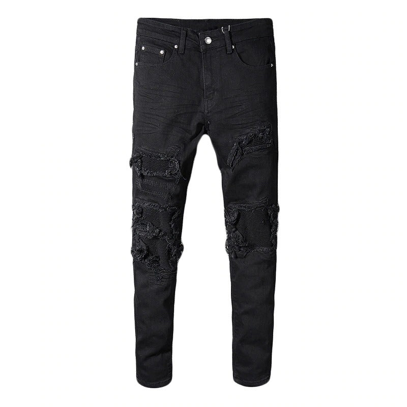 Black patchwork stretch biker jeans with ripped details for a stylish motorcycle look or everyday wear.