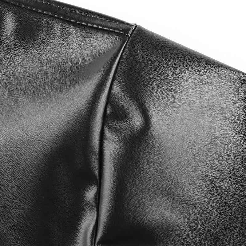 Close-up of the sleek black PU leather fabric showcasing smooth texture and stitching details for women's blouse.