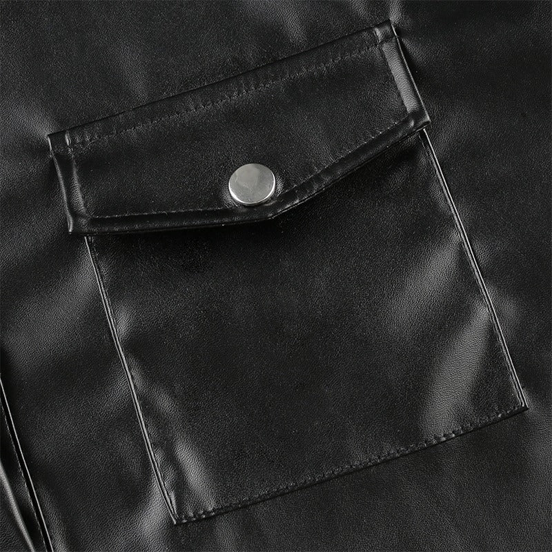 Close-up of a black PU leather blouse pocket with snap button, showcasing stylish design for women.