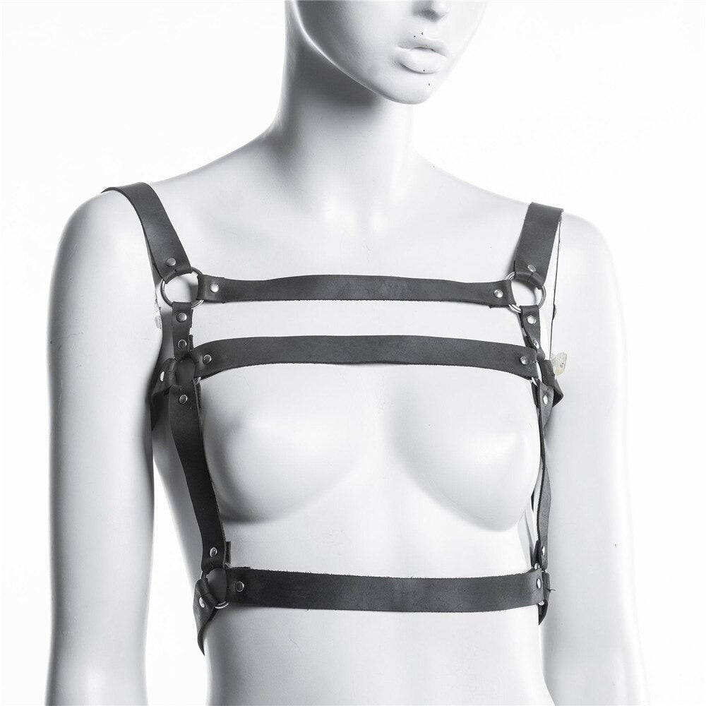 Black PU leather body harness on mannequin, featuring adjustable belts and metal accents for a gothic punk style.