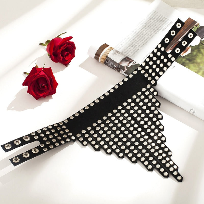 Black PU leather choker with rivets, gothic jewelry accentuating style, perfect for edgy fashion and special occasions.