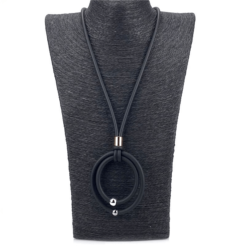 Elegant black round pendant necklace with alloy beads showcased on a display stand, perfect for women's casual fashion.