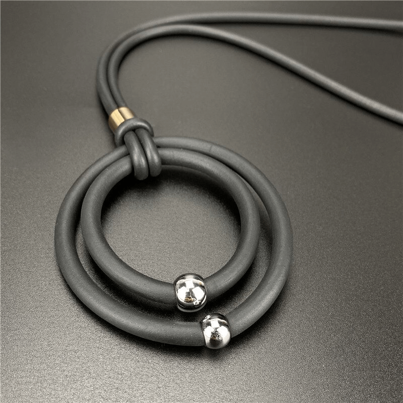Black round pendant necklace with alloy beads, perfect for casual women's fashion accessories.