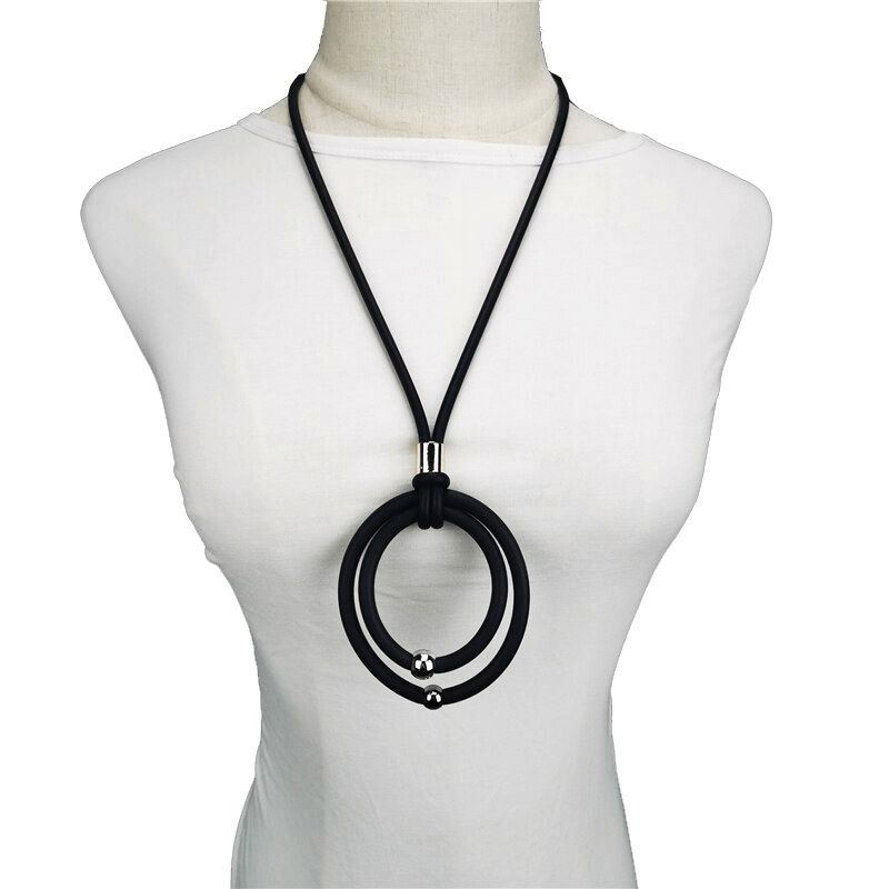 Black round pendant necklace with alloy beads displayed on a mannequin, perfect for casual women's fashion.