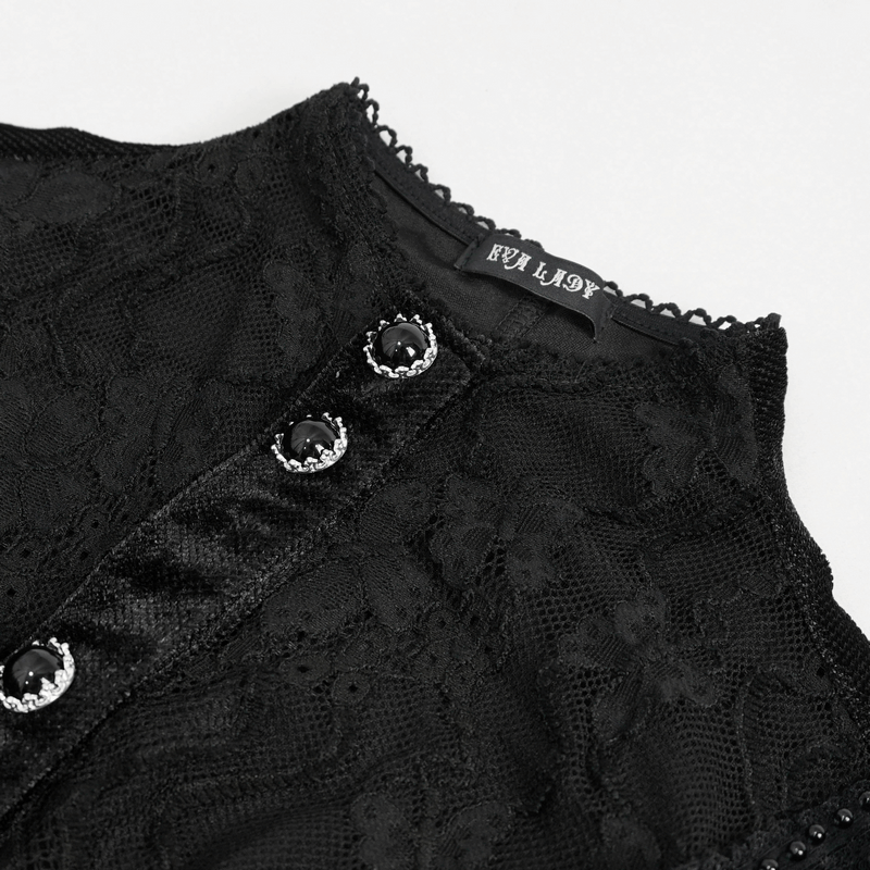 Close-up of a black lace blouse with velvet fabric and decorative buttons for a gothic stylish look.