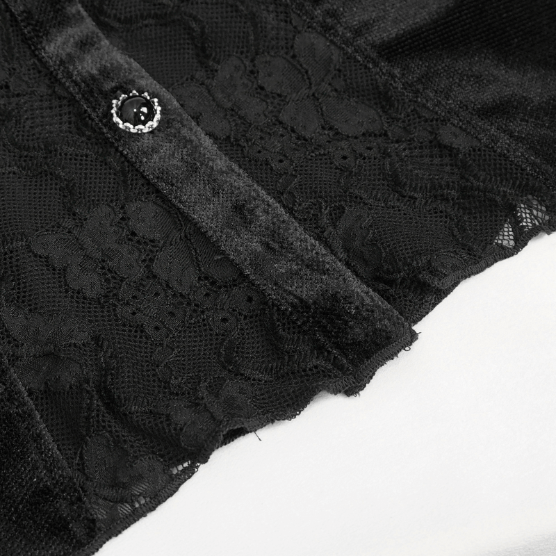 Close-up of a black lace and velvet blouse with ruffled sleeves and decorative buttons, perfect for gothic style.