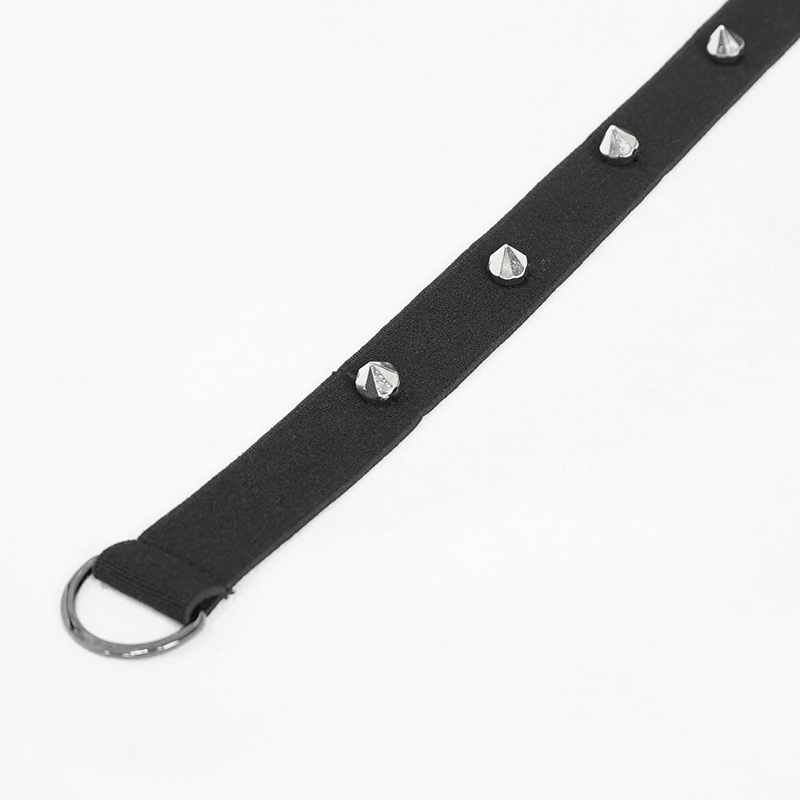 Black choker with silver studs and a ring, perfect for adding a stylish gothic touch to any outfit.