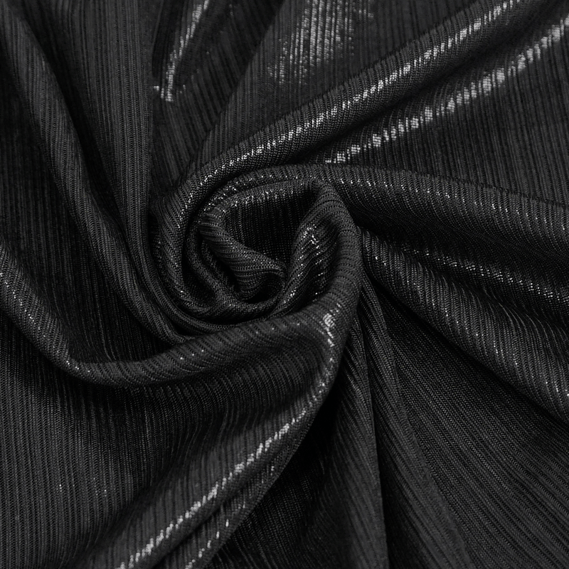 Close-up of luxurious black fabric with a subtle shine, perfect for gothic style dresses.