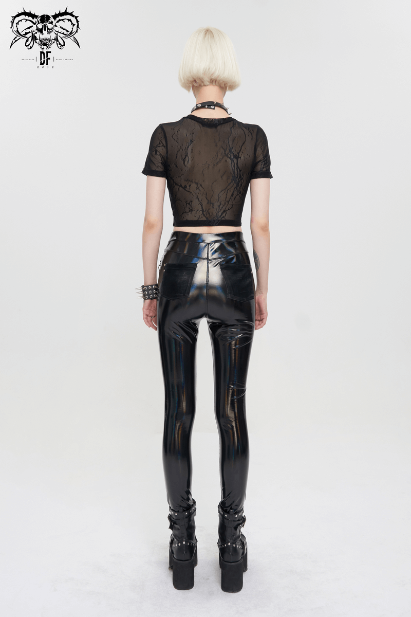 Back view of a model in a black sexy PU leather crop top and shiny leggings, showcasing trendy punk fashion.