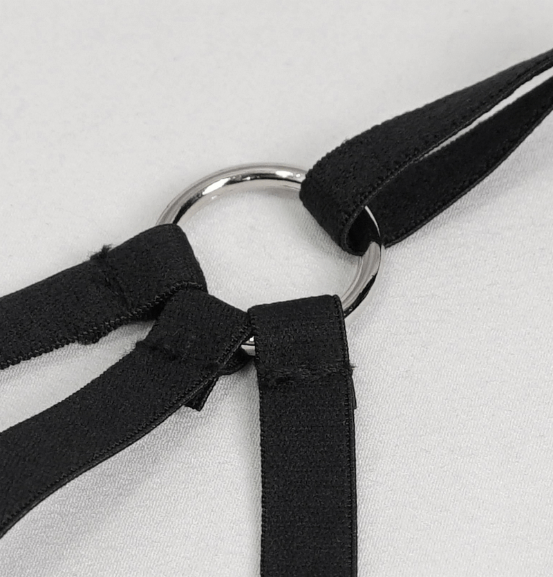 Close-up of a black bra's detailing, featuring a faux leather neck strap and metal ring, perfect for a gothic punk look.