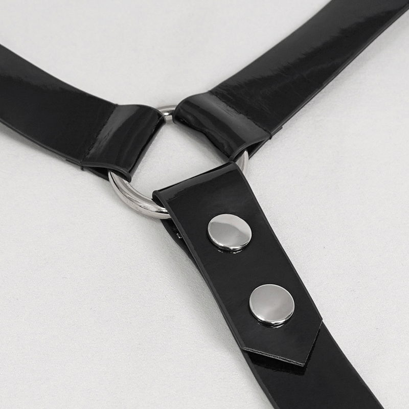 Close-up of faux leather neck strap with metal ring and snap buttons, perfect for a gothic punk style black bra.