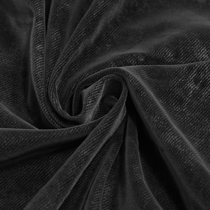 Close-up of soft black fabric, showcasing a rich texture ideal for punk-style clothing.