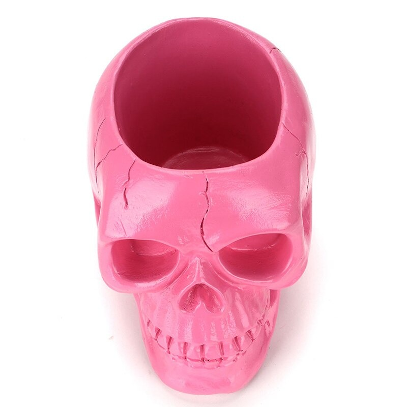 Pink skull desktop pen holder for Halloween, perfect for office storage or quirky home decor.