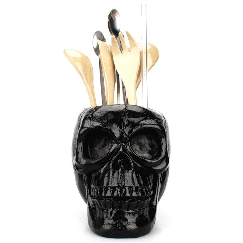 Black skull desktop pen holder with wooden utensils, perfect for Halloween decor and office storage.