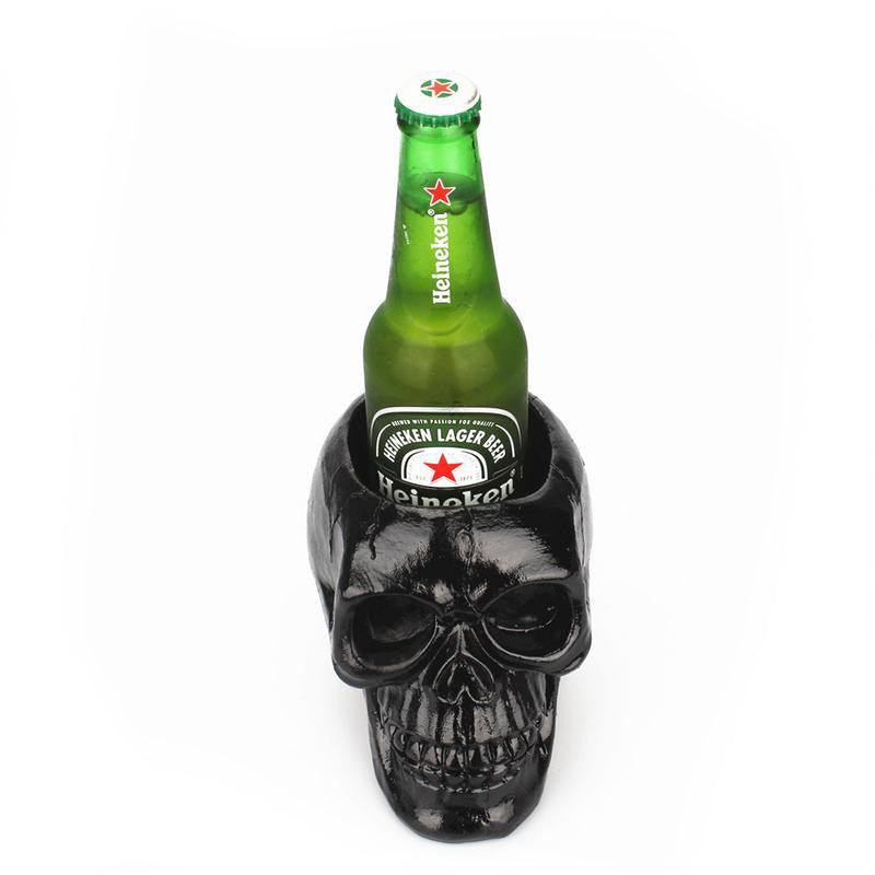 Black skull desktop pen holder with a green beer bottle, perfect for Halloween decor and office storage.
