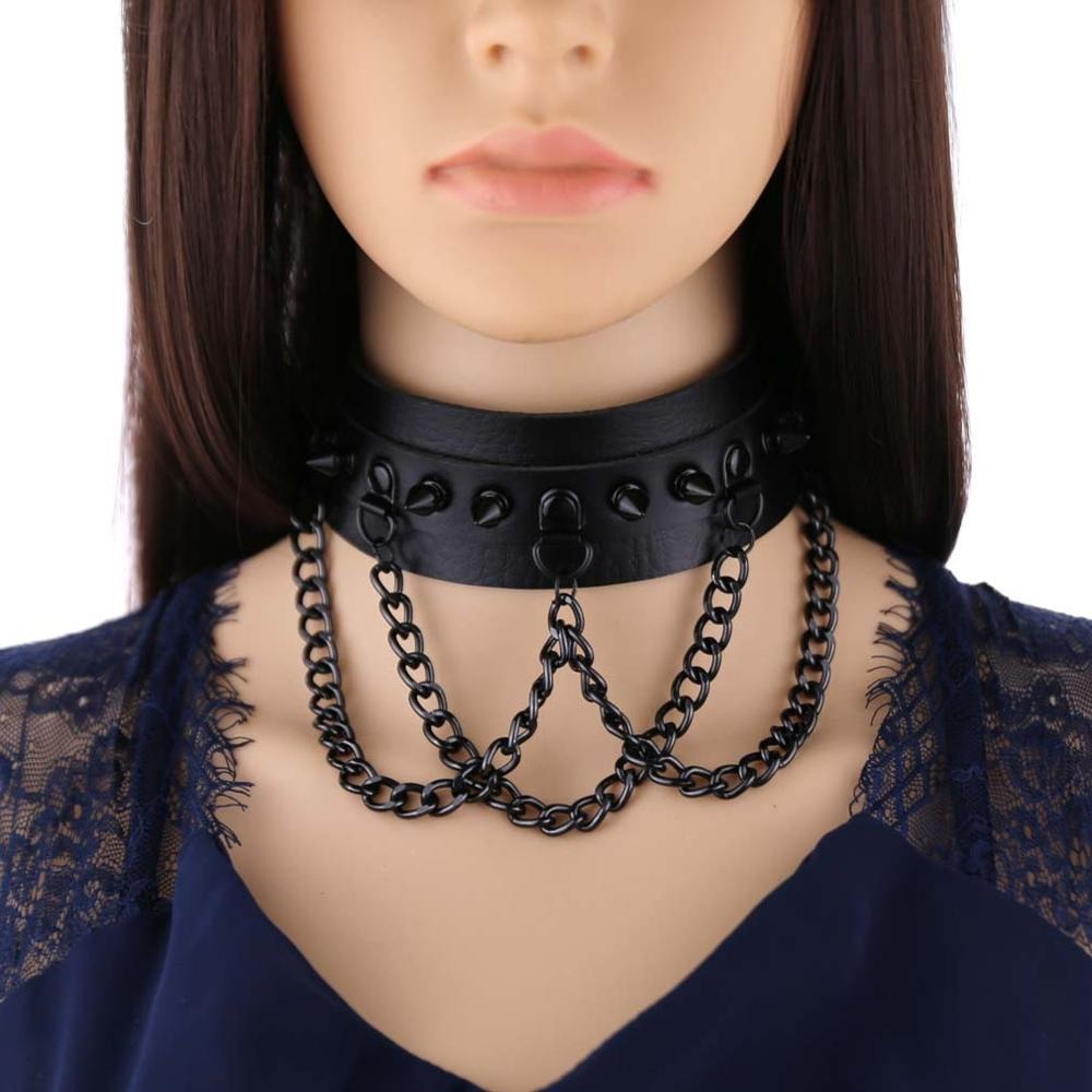 Black spike collar choker with chains, perfect gothic accessory for a rockstar look.
