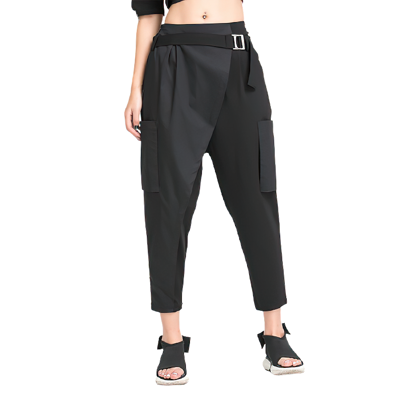 Trendy black spliced women's harem pants featuring pockets and a stylish buckle, perfect for alternative fashion.