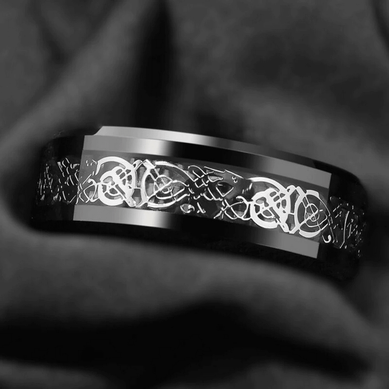 Gothic black stainless steel ring with intricate dragon pattern, perfect unisex jewelry accessory.