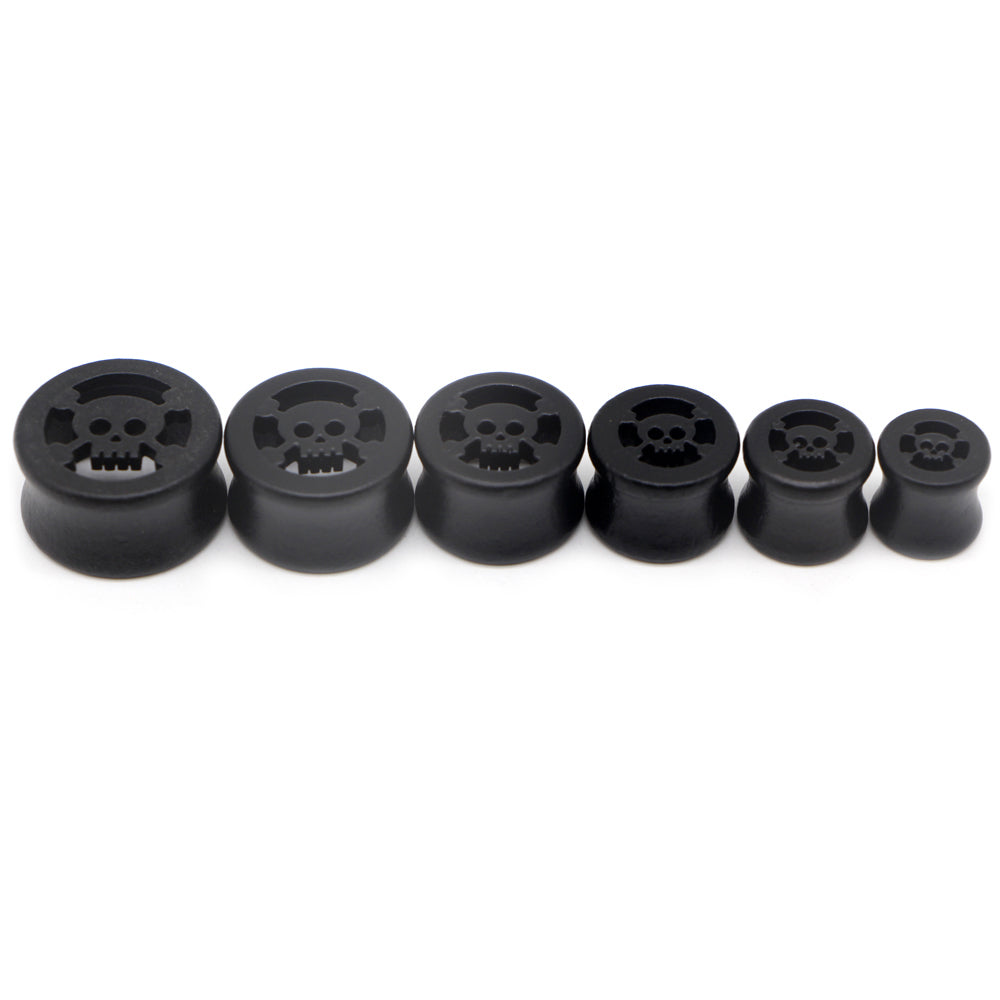 Black wood plugs and tunnels with skull design, perfect for punk rock style body piercing. Unisex gauges available in various sizes.