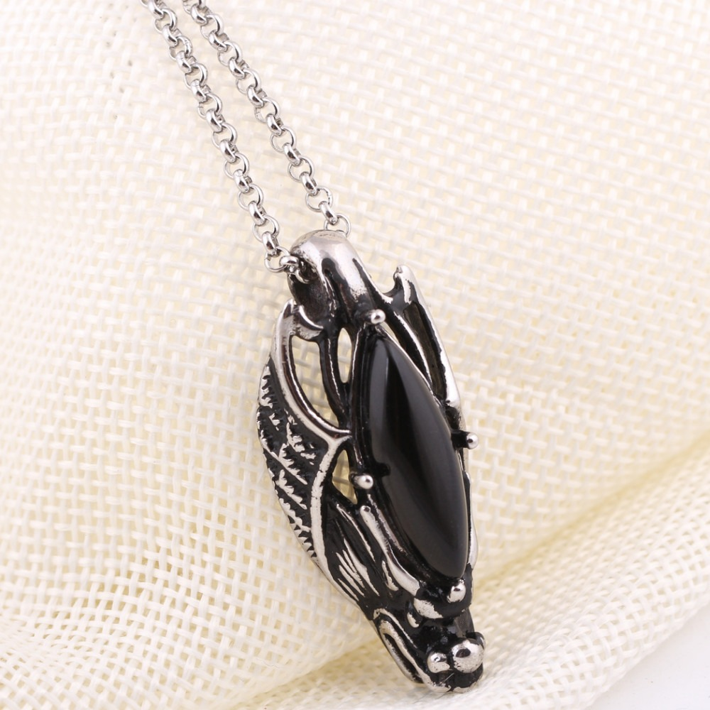 Black stone decorated dragon head pendant necklace in stainless steel, perfect for gothic and punk jewelry lovers.
