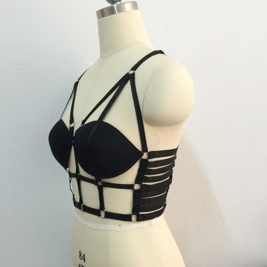 Black strappy cage bra body harness in gothic style, perfect for outfits and bedroom activities.