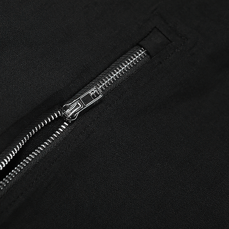 Close-up of zipper detail on black stretch flared pants, showcasing high-waisted design in alternative style.