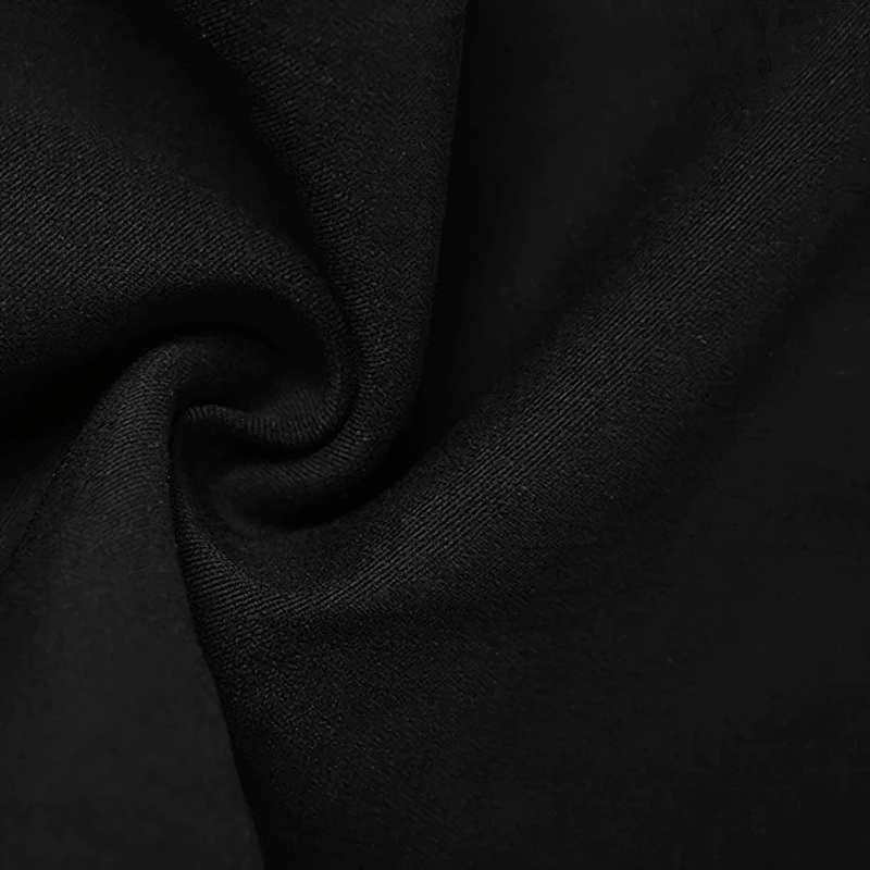 Close-up of soft black fabric showcasing the texture of high-waisted zipper flared trousers.
