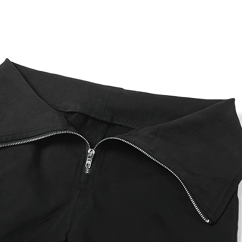 Close-up of the zipper detail on black high-waisted flared pants for women, showcasing alternative style clothing.
